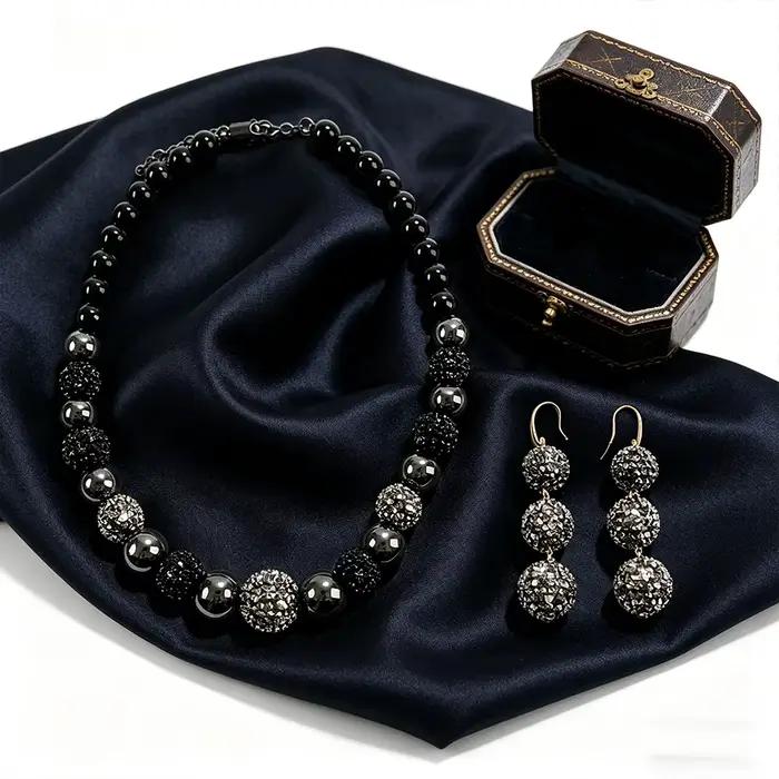 Ensemble de bijoux boule de cristal noir et argenté, collier perlé et boucles d'oreilles à trois pen