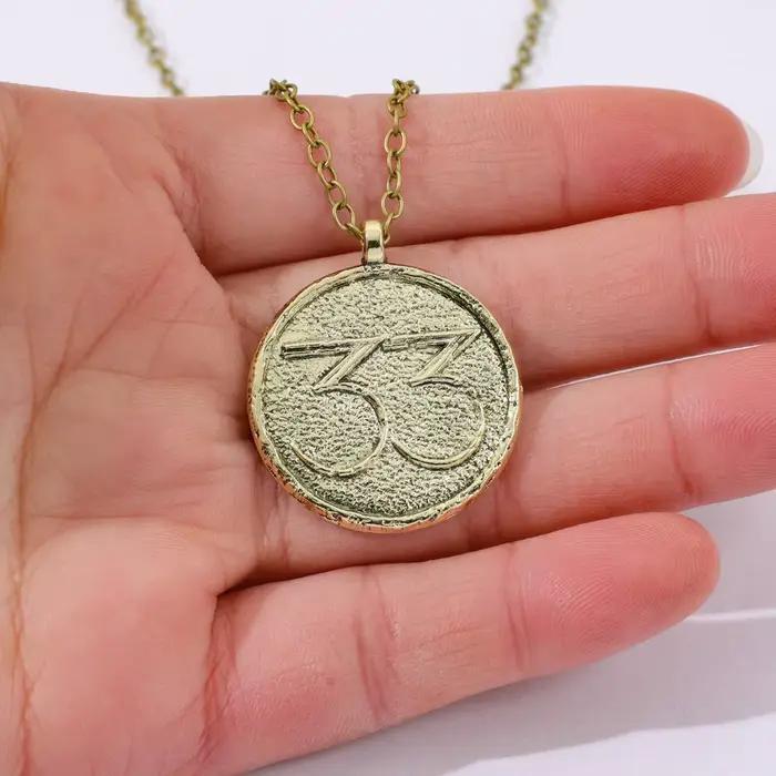 Collier pendentif amulette vintage Clair Obscur expédition 33 bijou pour femmes et hommes occasions spéciales
