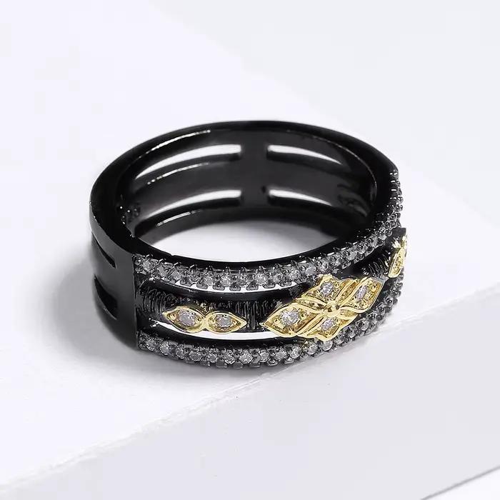 Bague bicolore noire et or pour femme