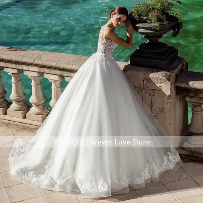 Robe de Mariée Élégante Blanche Sans Manches Coupe Trapèze Dos Illusion Princesse Décolleté En V Appliques En Dentelle Pour Femme Occasions Spéciales