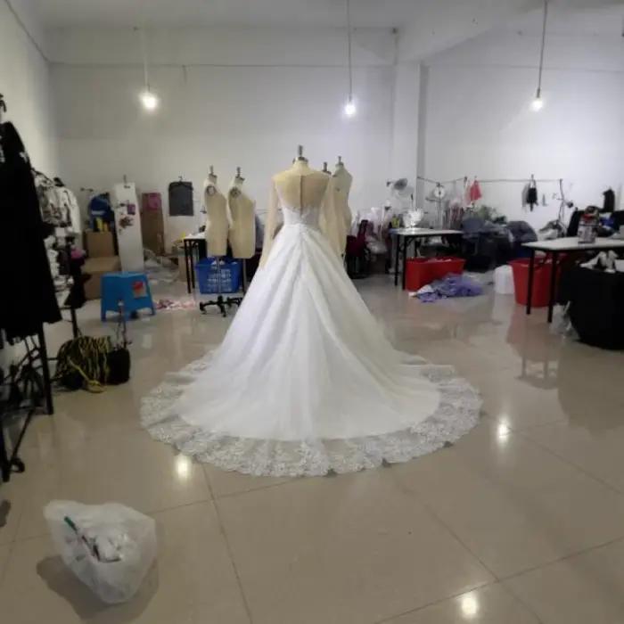 Robe de mariée en maille à manches longues