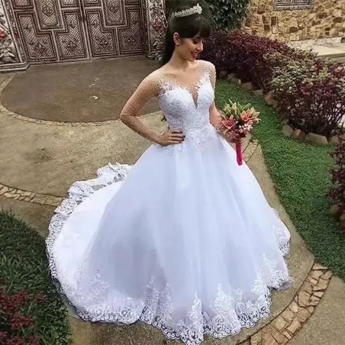 Robe de mariée en maille à manches longues