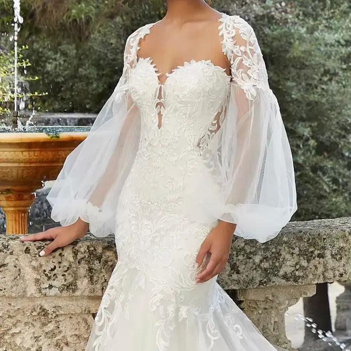 Robe de mariée sirène/trompette sexy avec appliques