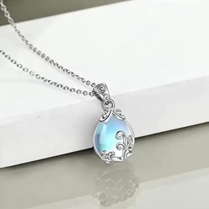 Collier pendentif en pierre d'opale simulée pour femme, bijou de mariage unique, design moderne et élégant, accessoire pour cérémonie, cadeau romantique