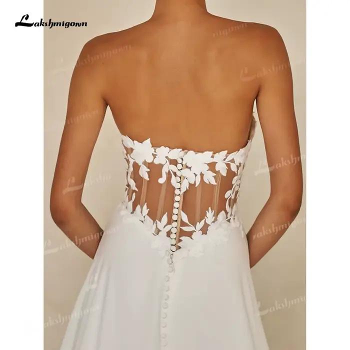 Robe de mariée bohème moderne en mousseline de soie avec ruban