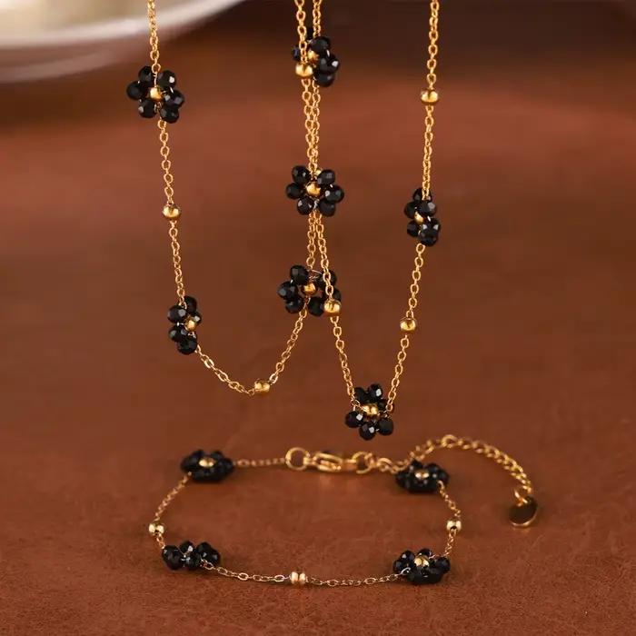 Ensemble de bijoux fleur noire collier et bracelet plaqué or acier inoxydable pour femmes romantiques et élégantes occasions spéciales