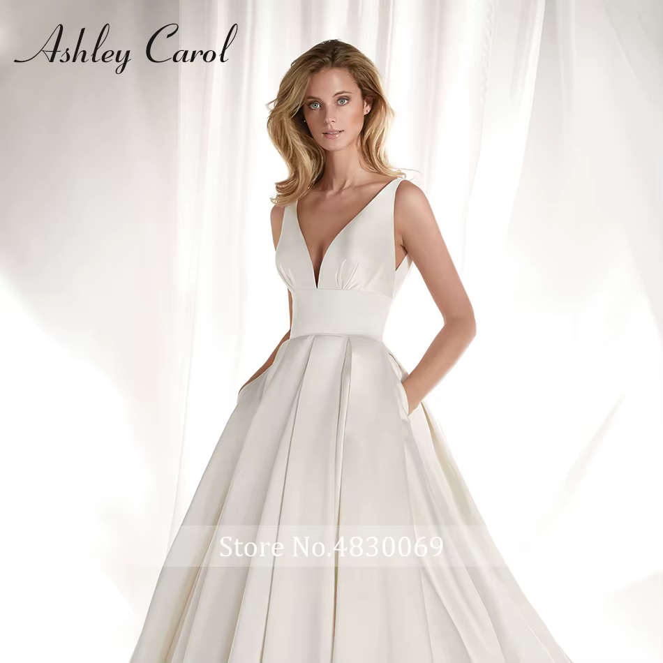 Robe de mariée en satin sexy à décolleté plongeant en V, avec nœud simple et traîne courte, style pr