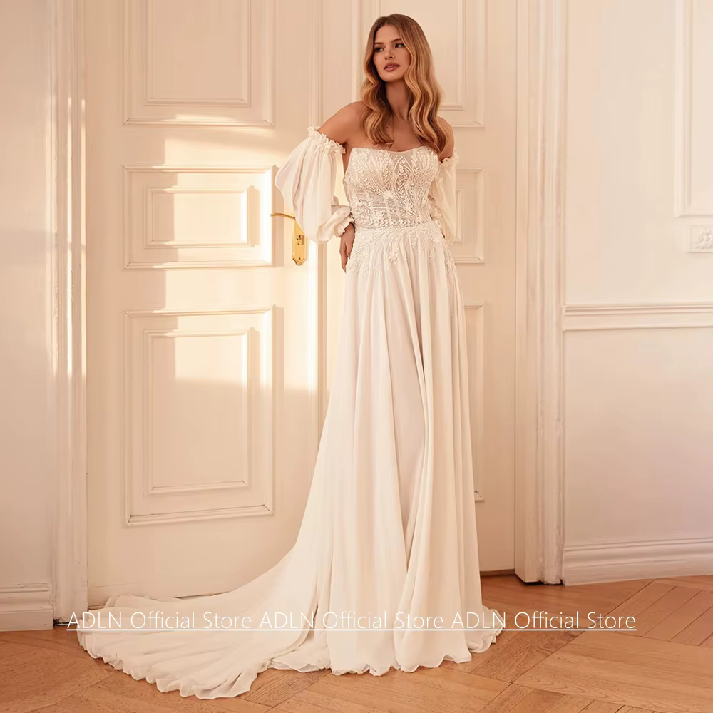 Robe de mariée nouvelle collection personnalisée sans bretelles avec manches bouffantes, appliques e