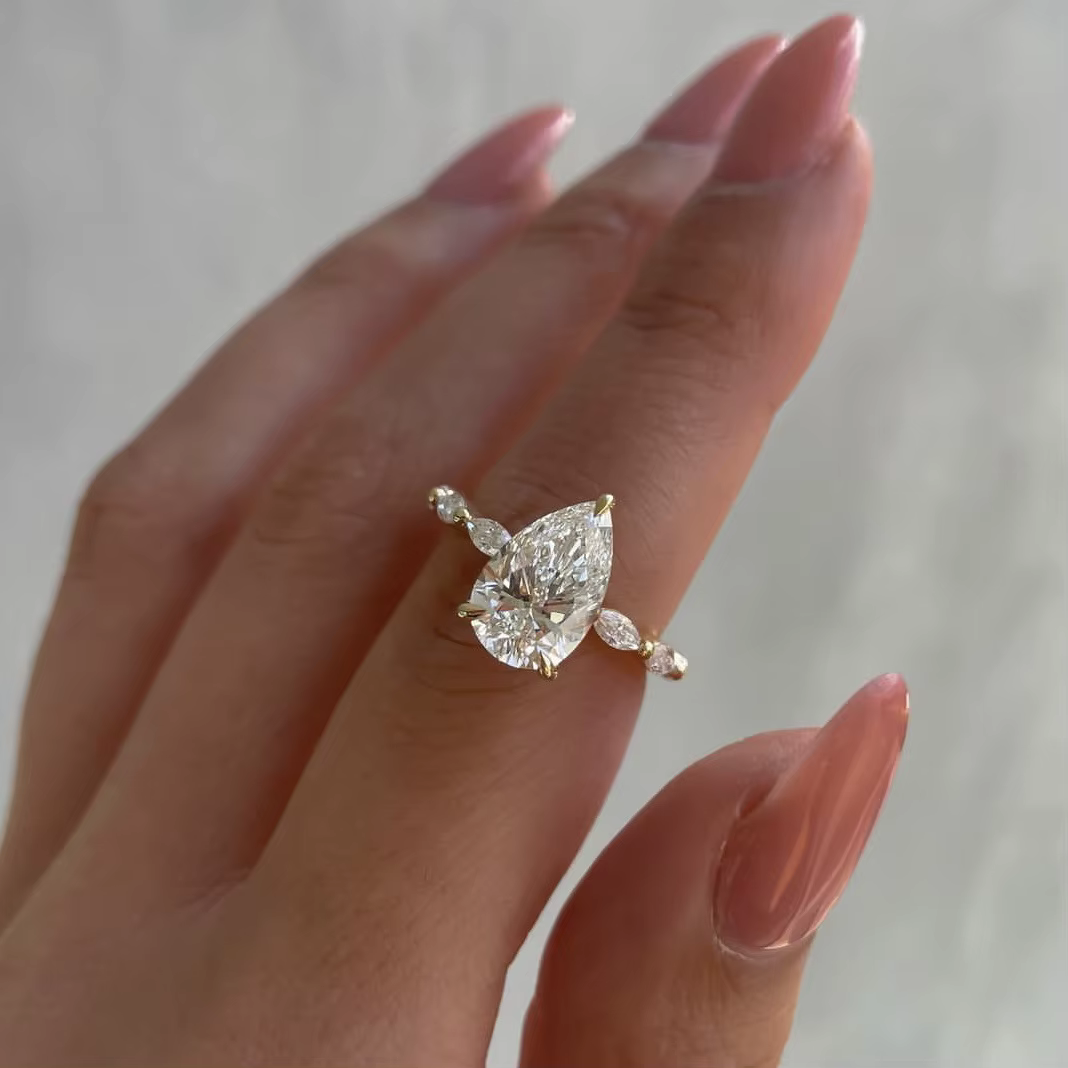 Bagues en acier inoxydable plaqué or pour femmes, très vendues, avec zircon en forme de goutte d'eau