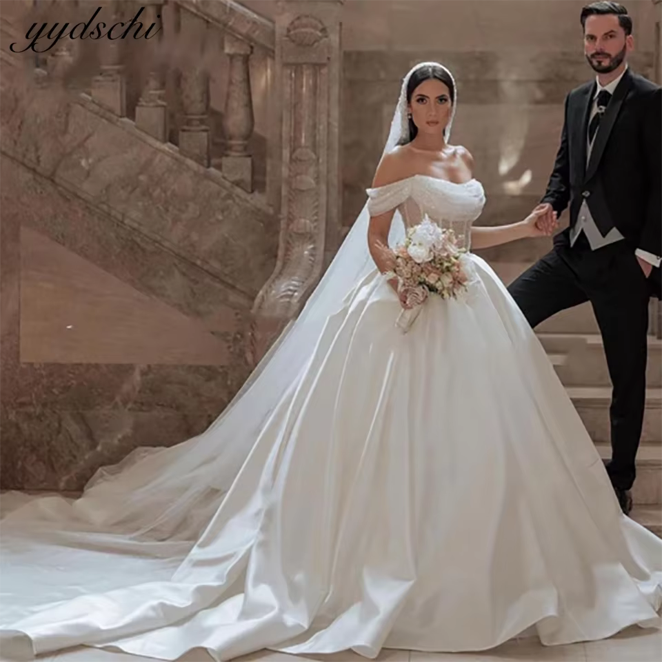 Robes de mariée personnalisées 2026 en mousseline perlée et satin, col bateau sans manches, style ro