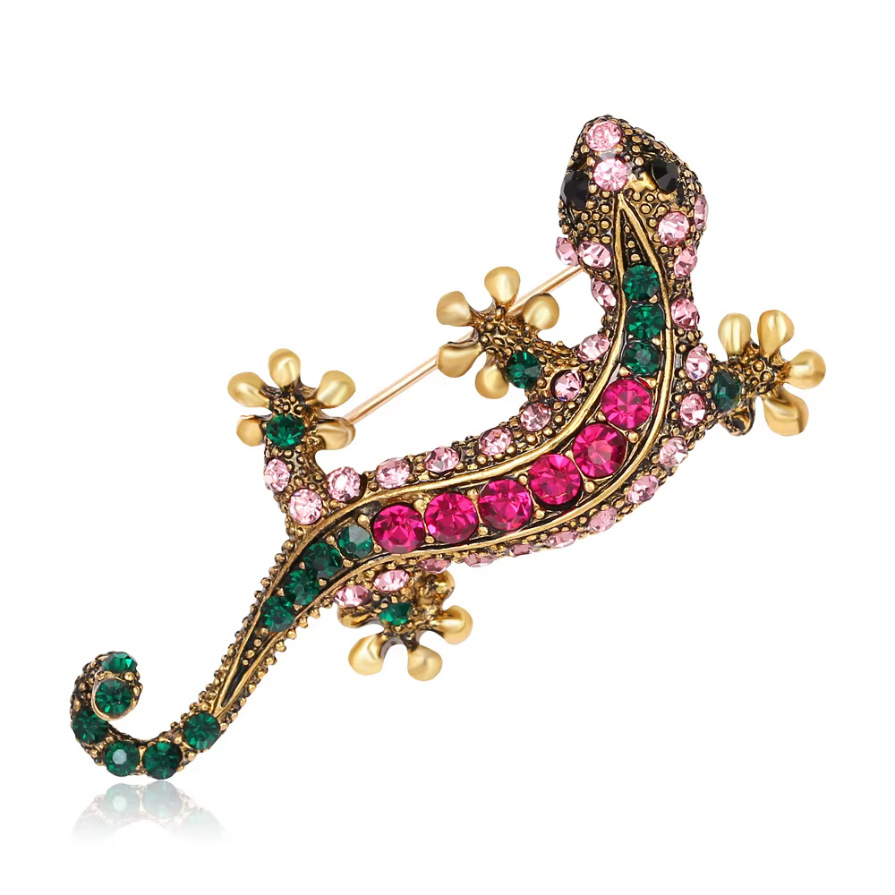 Les strass étincelants sont ornés de lézards, geckos, broches serpent à quatre pattes, cadeaux de bi
