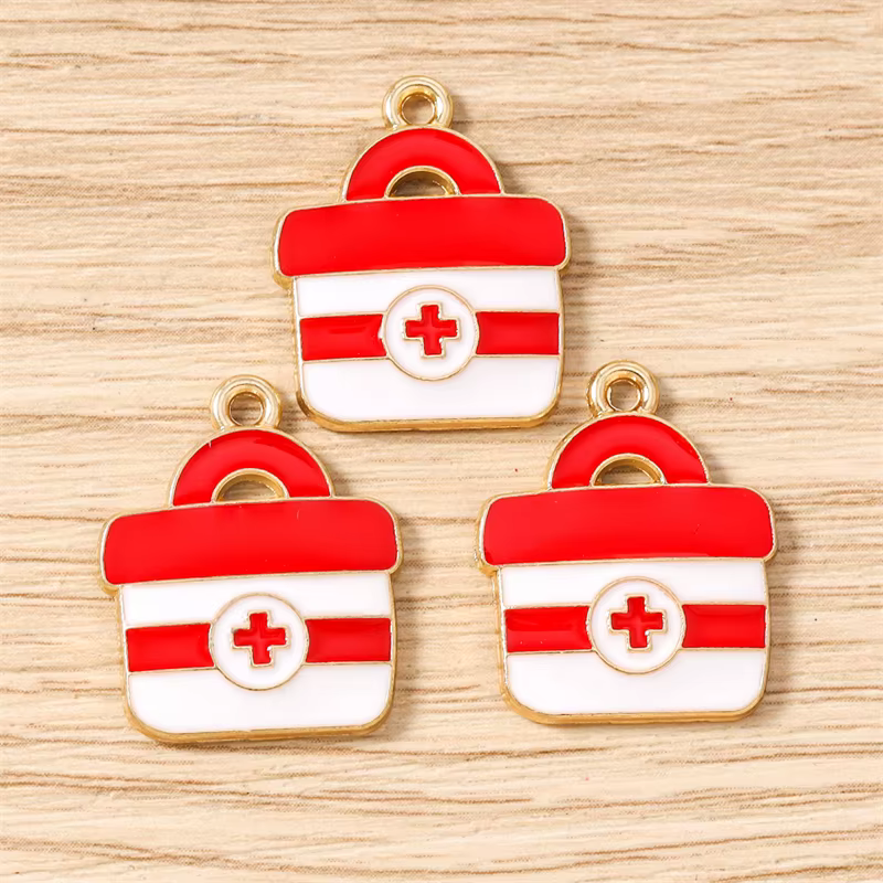 10 pendentifs breloques en émail mignons de 18x22mm sur le thème du kit médical pour la fabrication 