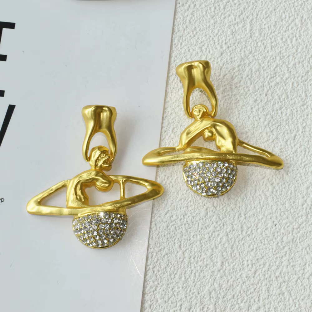 Boucles d'oreilles pendantes en alliage scintillant plaqué planète saturne pour femmes, bijoux défil