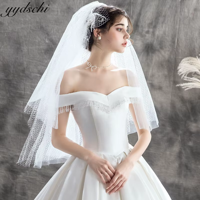 Robes de mariée personnalisées 2026 pour femme, col bateau, épaules dénudées, sans manches, coupe Em