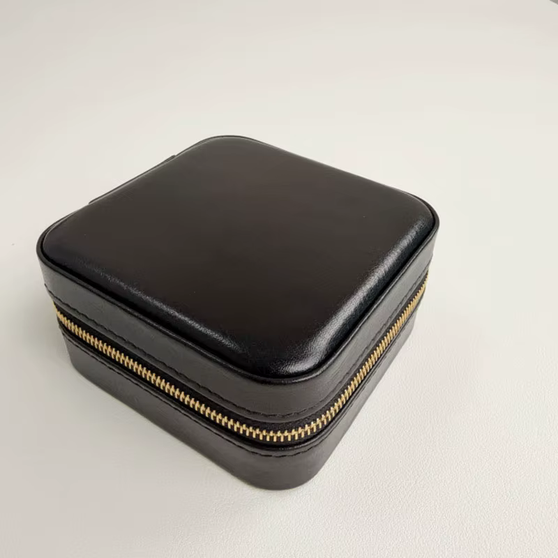 Boîte à bijoux pour collier portable multi-compartiments haut de gamme en cuir de vache ciré à l'hui