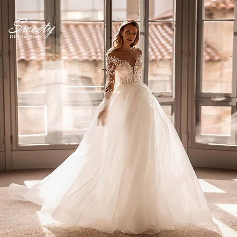 Robe De mariée élégante en dentelle brodée sur filet, manches longues, ligne a, col rond, boutons De