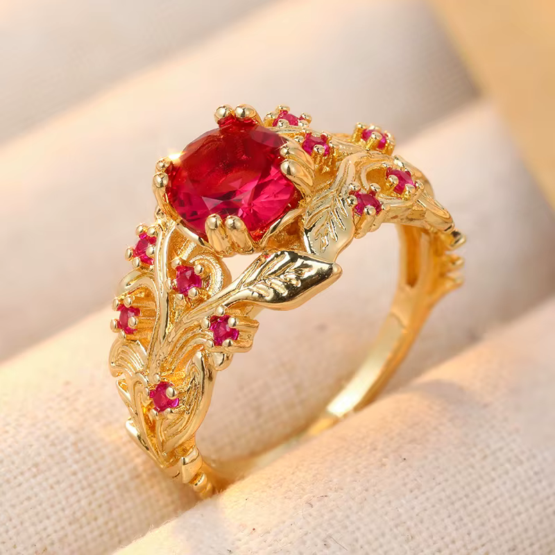 Magnifique bague pour femme incrustée de feuilles de CZ rouge, couleur or éblouissante, sculptée à l