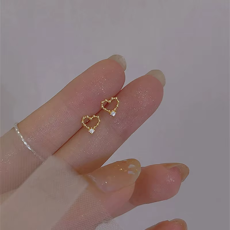 Boucles d'oreilles à nœud papillon en cristal brillant pour femmes, couleur or, vêtements quotidiens