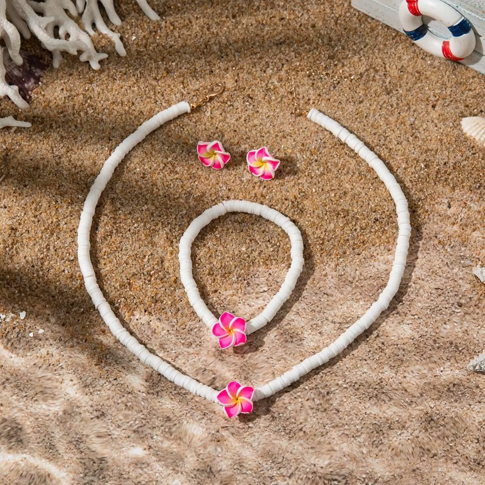 Ensemble de bijoux bohème chic, chaîne en corde tressée, élégant bracelet à grandes fleurs en perles