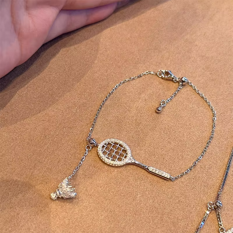 Ensemble de bijoux haut de gamme et tendance : raquette de badminton avec incrustations de diamants 