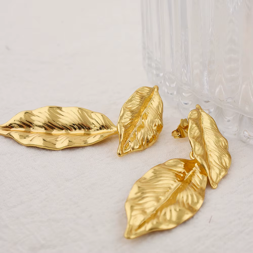 Boucles d'oreilles de luxe en forme de feuilles de métal pour femmes, couleur or, bijoux géométrique