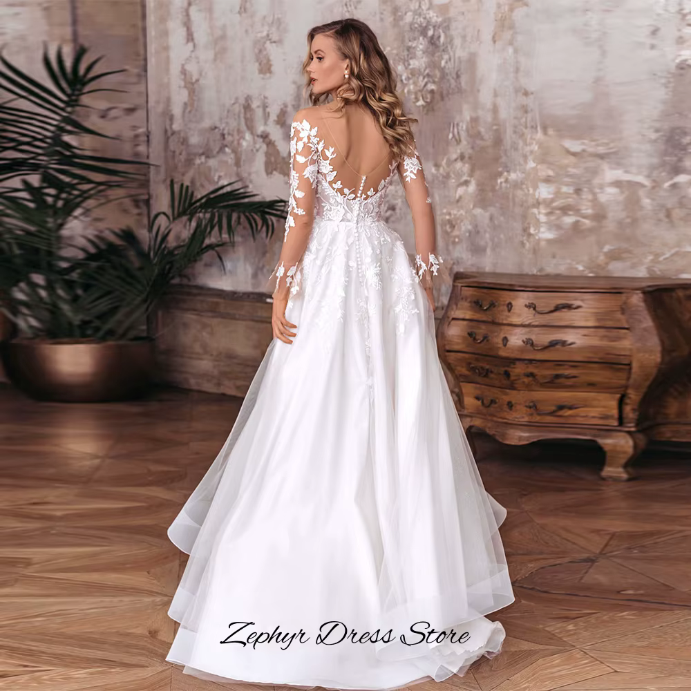 Robe de mariée élégante coupe trapèze à manches longues
