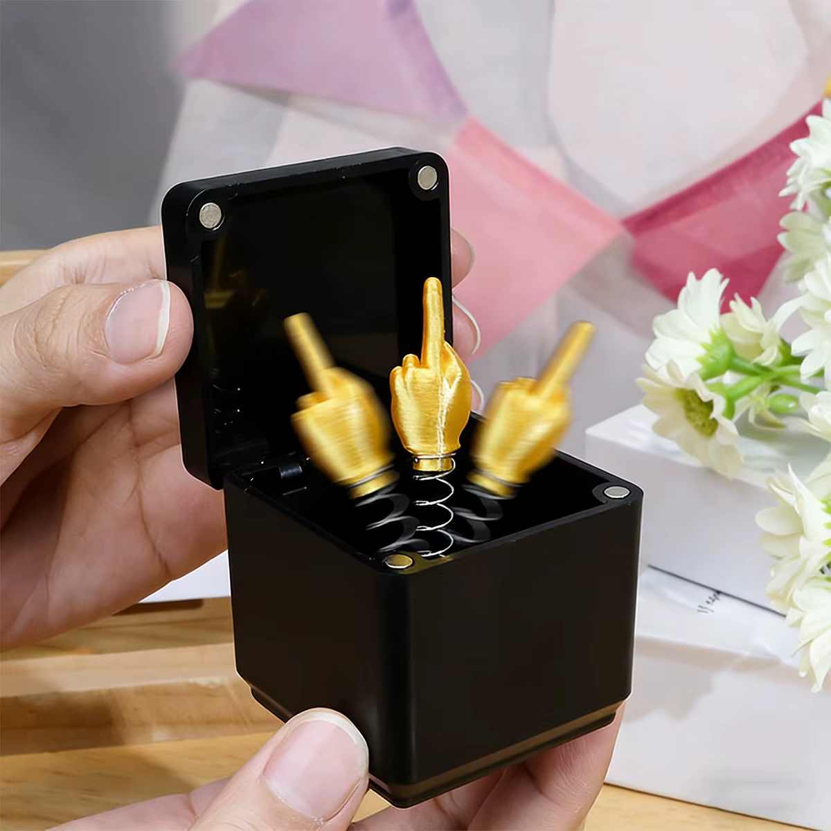 1 boîte cadeau pop-up en forme de doigt d'honneur