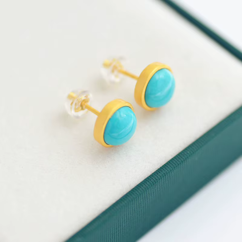 Boucles d'oreilles rondes turquoises incrustées en argent