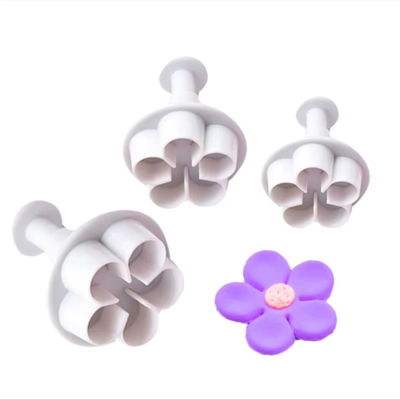 Emporte-pièce à piston de fleurs