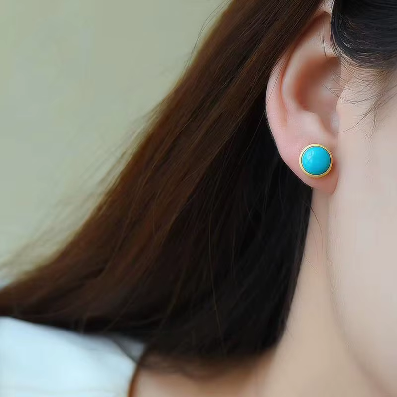 Boucles d'oreilles rondes turquoises incrustées en argent