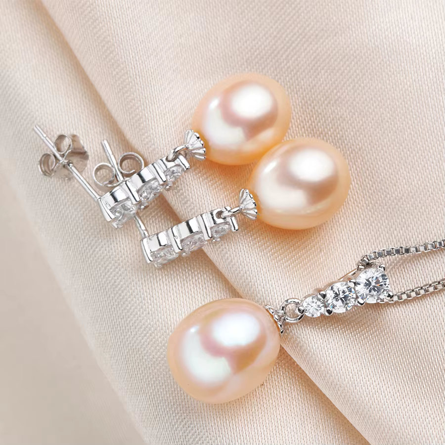 Dainashi 2026 Ensemble de bijoux exquis avec pendentif et boucles d'oreilles pour femmes
