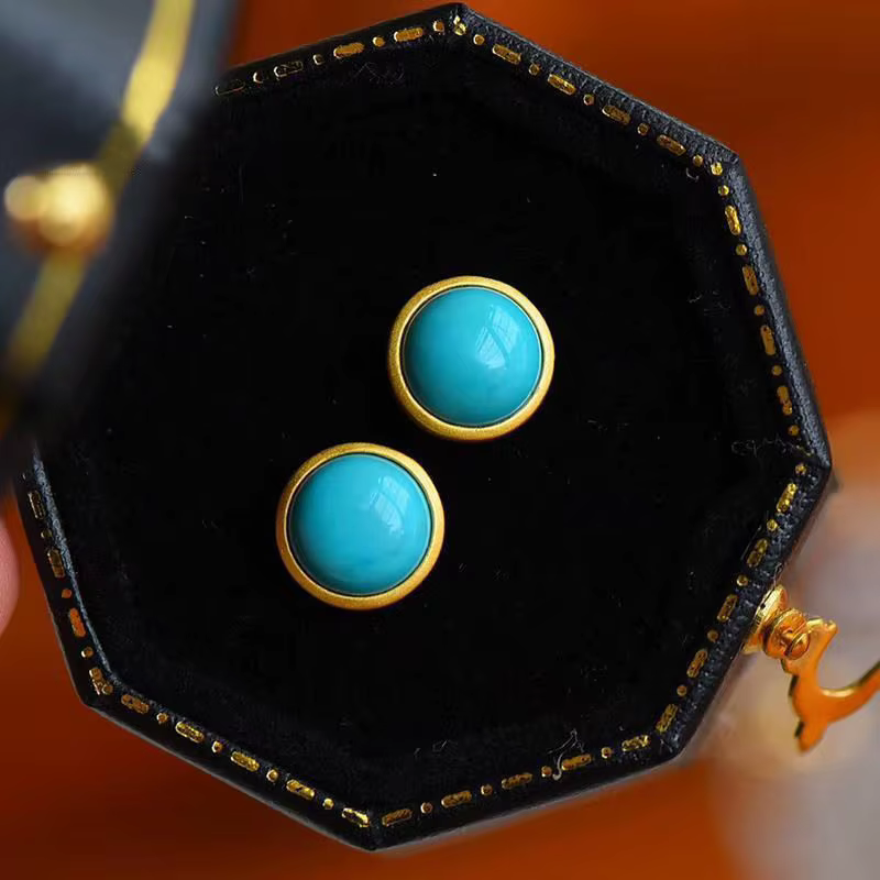 Boucles d'oreilles rondes turquoises incrustées en argent