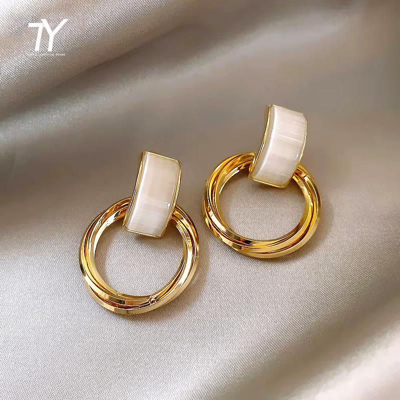 Boucles d'oreilles pendantes en forme de cercle opale