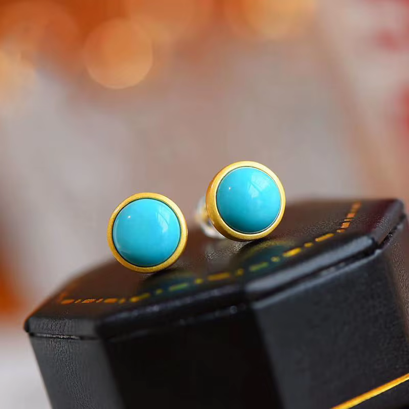 Boucles d'oreilles rondes turquoises incrustées en argent