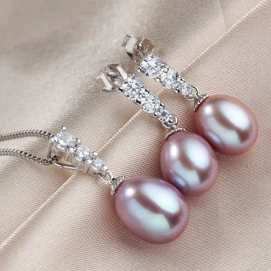 Dainashi 2026 Ensemble de bijoux exquis avec pendentif et boucles d'oreilles pour femmes
