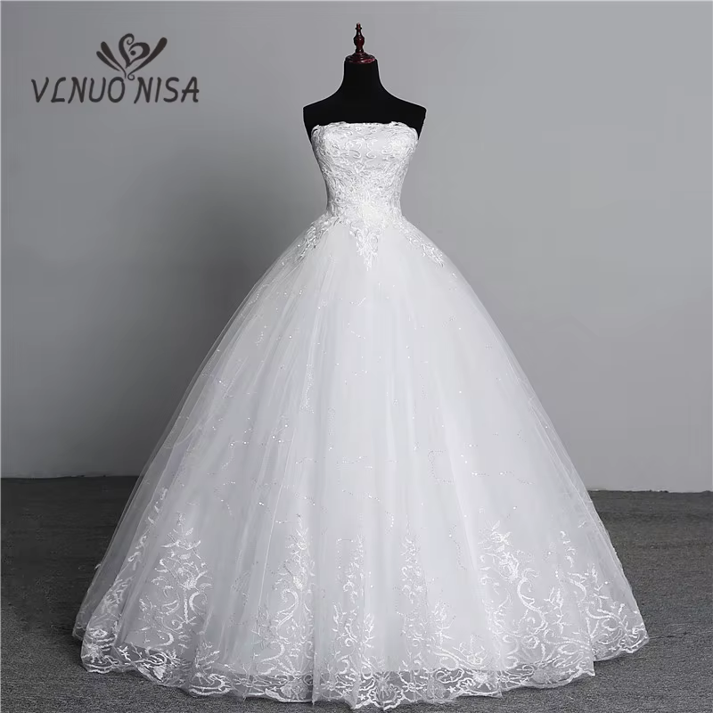 Robes de mariée ivoire sans bretelles en dentelle simple pour les mariées