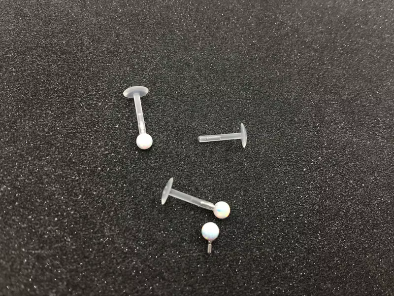 Retenues de piercing corporel