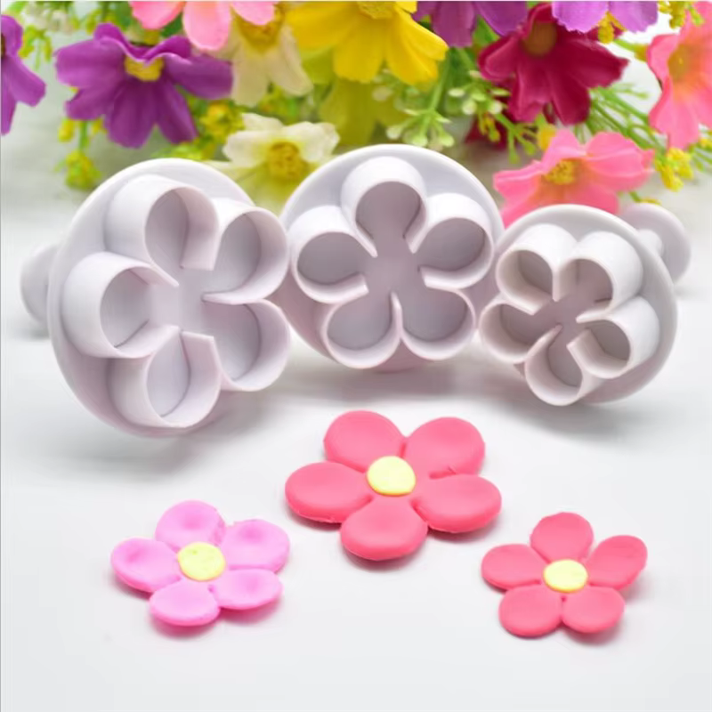 Emporte-pièce à piston de fleurs