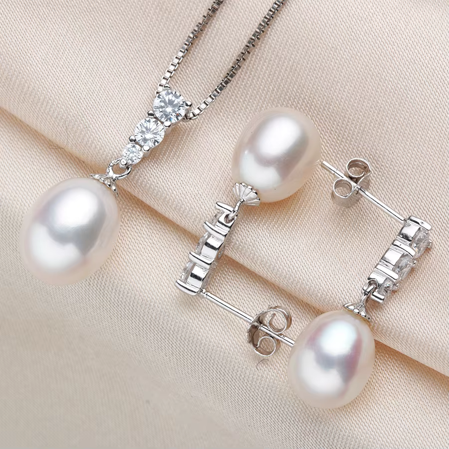Dainashi 2026 Ensemble de bijoux exquis avec pendentif et boucles d'oreilles pour femmes