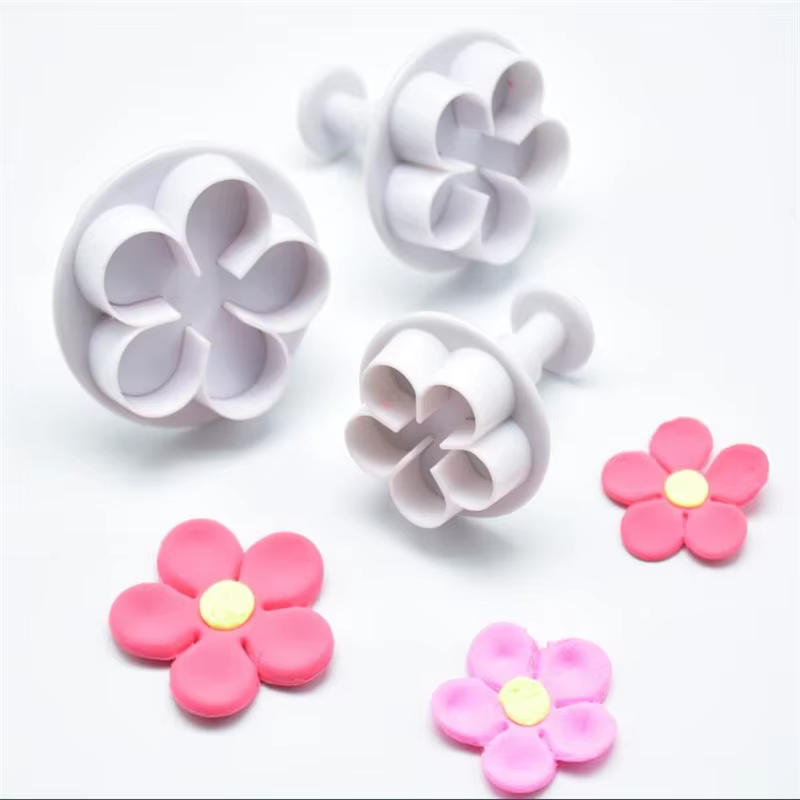 Emporte-pièce à piston de fleurs