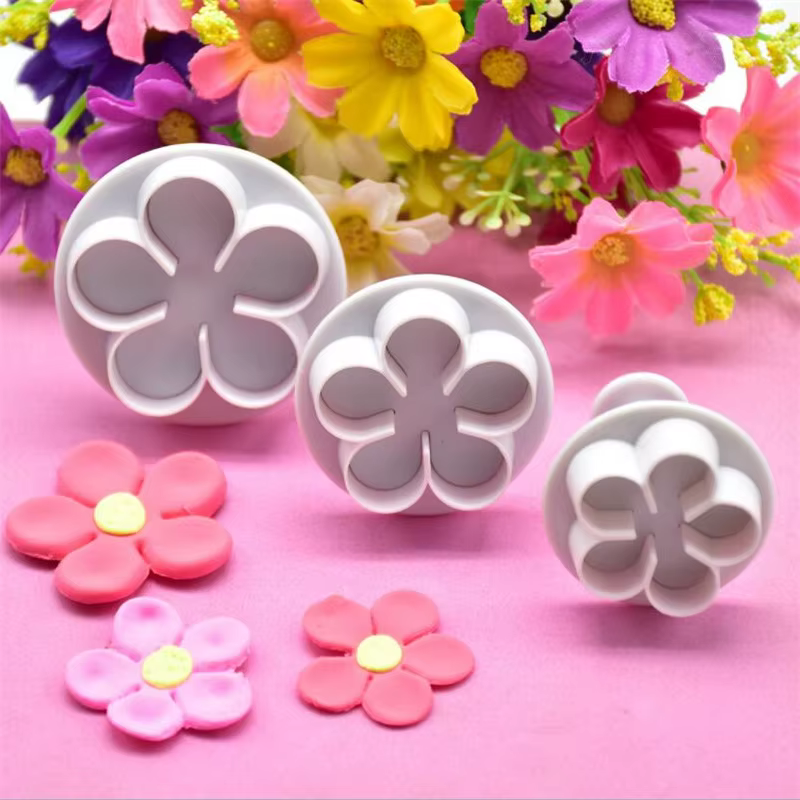 Emporte-pièce à piston de fleurs