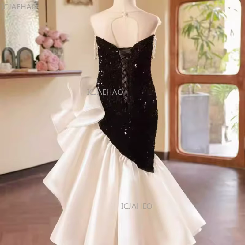 Robe de princesse sans bretelles à paillettes noires