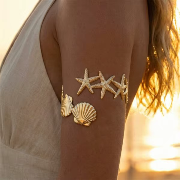 Bracelet de bras réglable en forme de coquillage étoile de mer pour femme