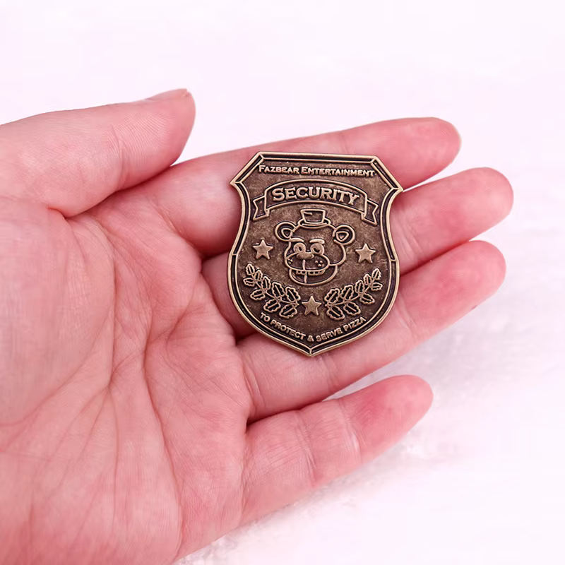 Broche vintage en émail avec logo d'ours