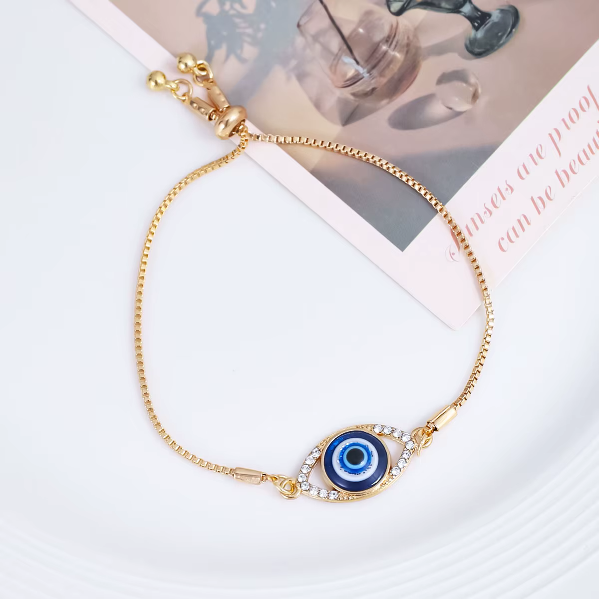 Bracelet ajustable plaqué or avec œil porte-bonheur