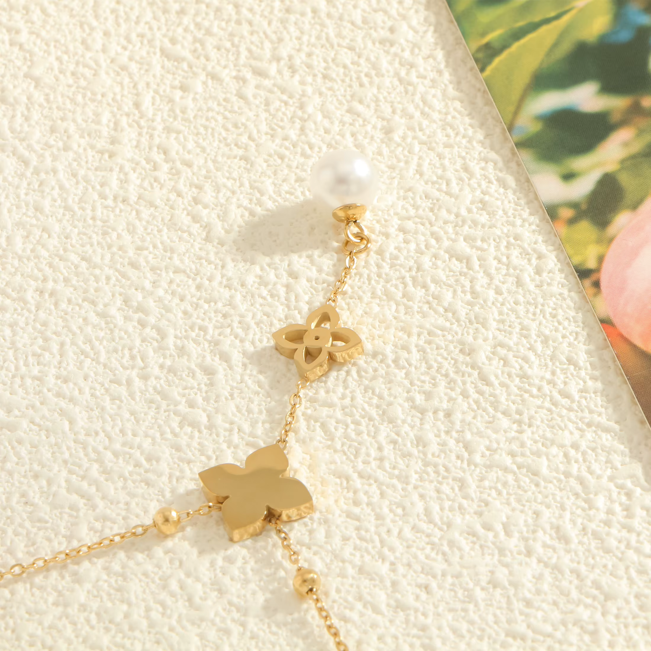 Pendentif trèfle à quatre feuilles en perles avec zircone