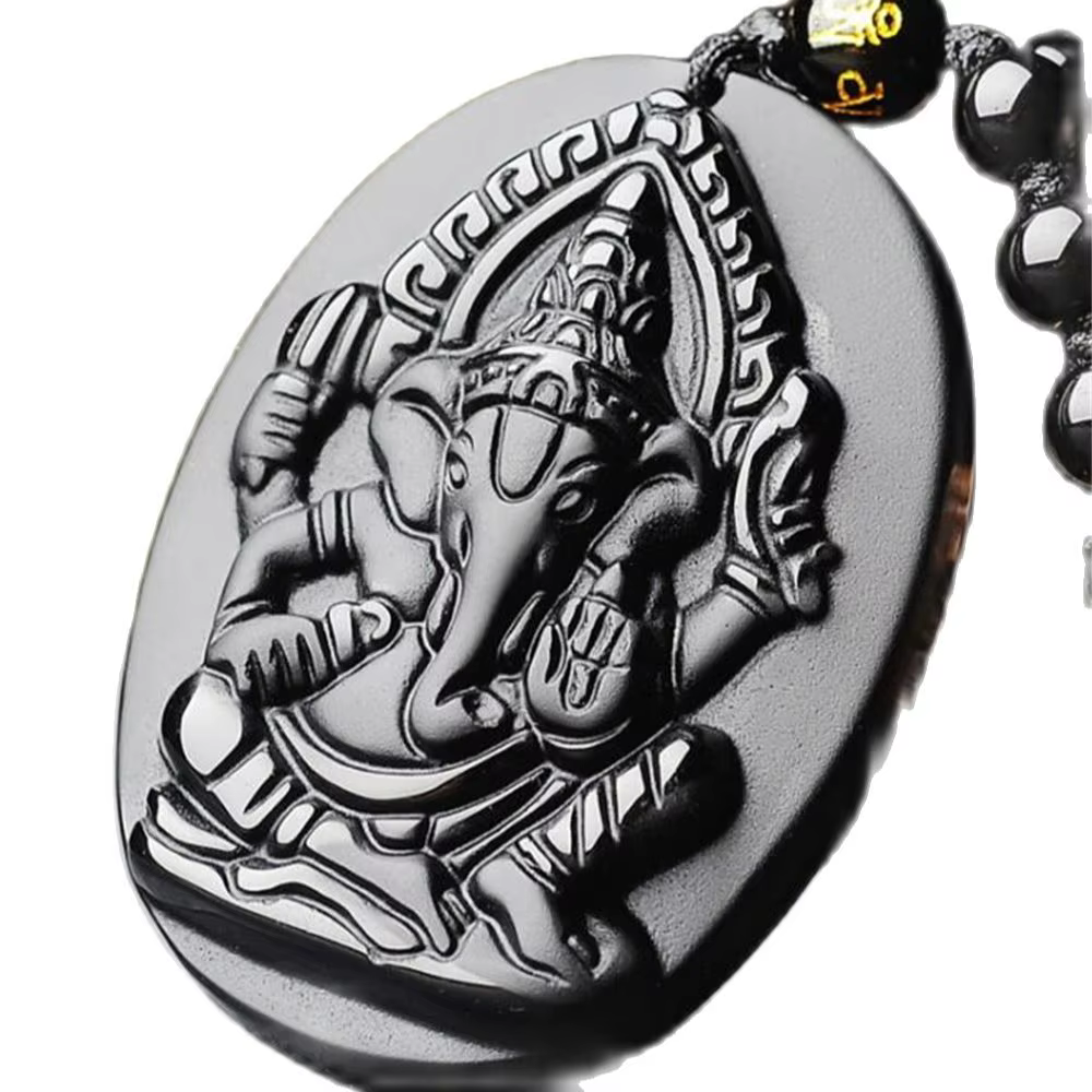 Beau pendentif en obsidienne noire naturelle sculptée à la main
