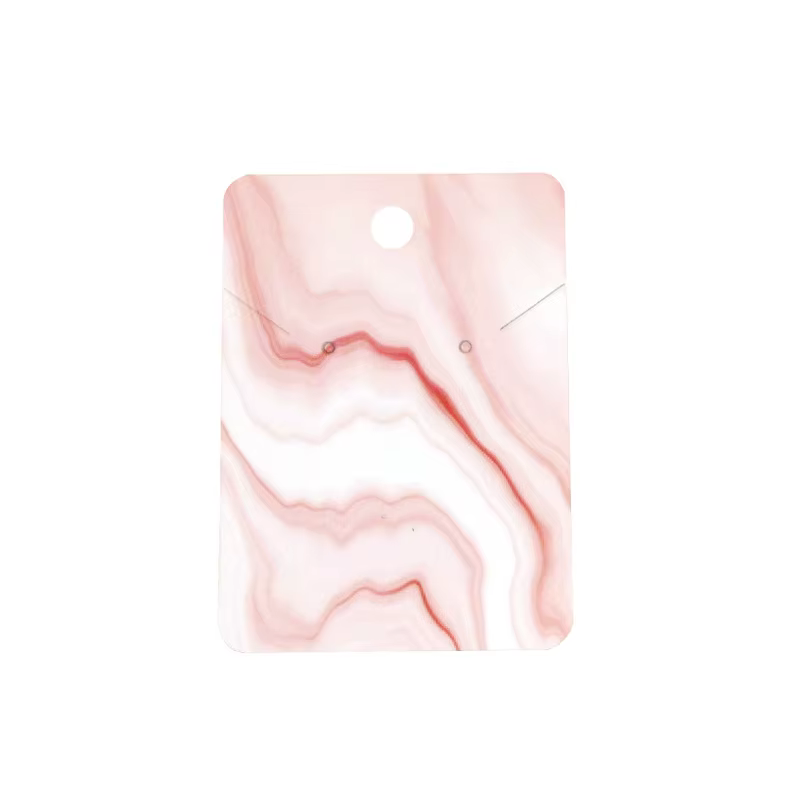 Présentoir de boucles d'oreilles en carton coloré