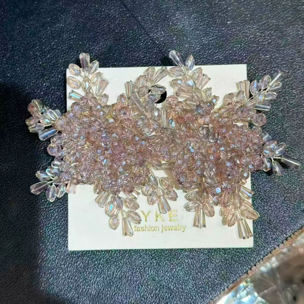 Boucles d'oreilles de mariée tendance en forme de flocon de neige