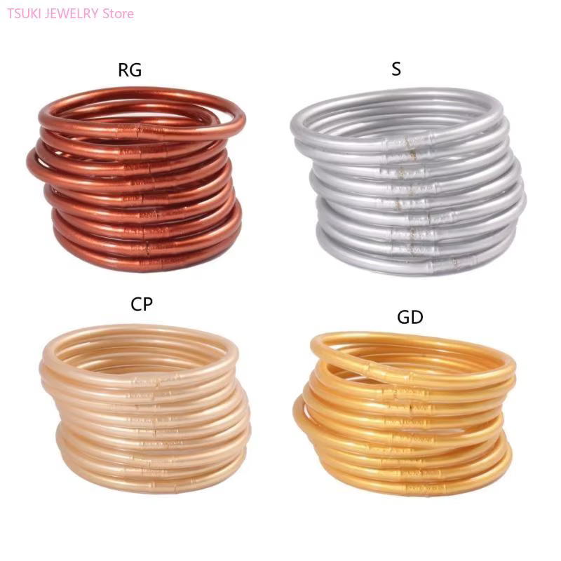 62KE – Bracelet gelée en plastique rempli feuille d'or clair